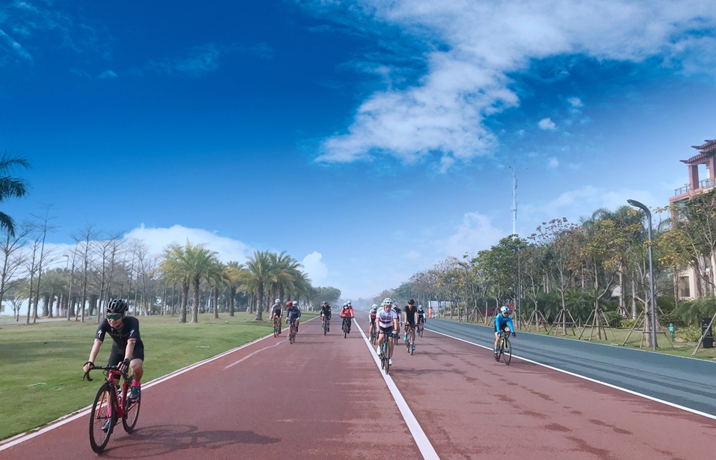 Cyclists Riding on the Road in Xiamen after Resumed Operations in March 2020